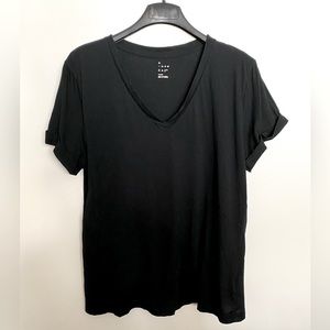 A New Day black v-neck t shirt. Size large.